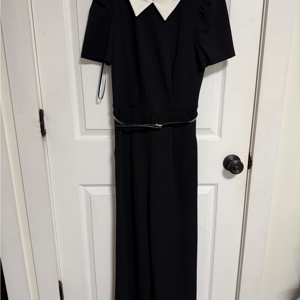 Black jumpsuit with White Collar